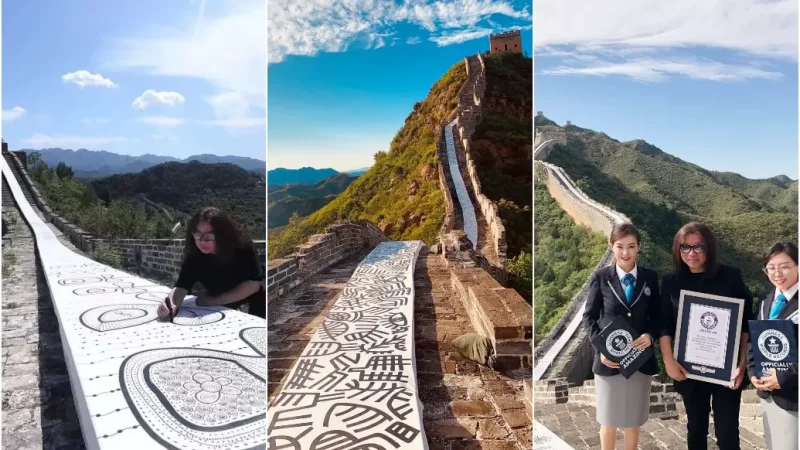 சீனப் பெருஞ்சுவரில் நீளமான ஓவியத்தை உருவாக்கி கின்னஸ் சாதனைப் படைத்த பெண்மணி!